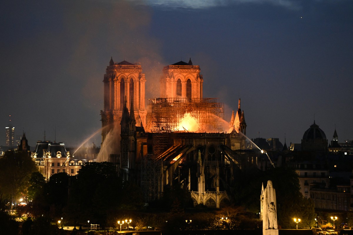 AFP__20241203__36NF4JG__v1__Preview__FilesFranceReligionHeritageMonumentNotreDame.jpg