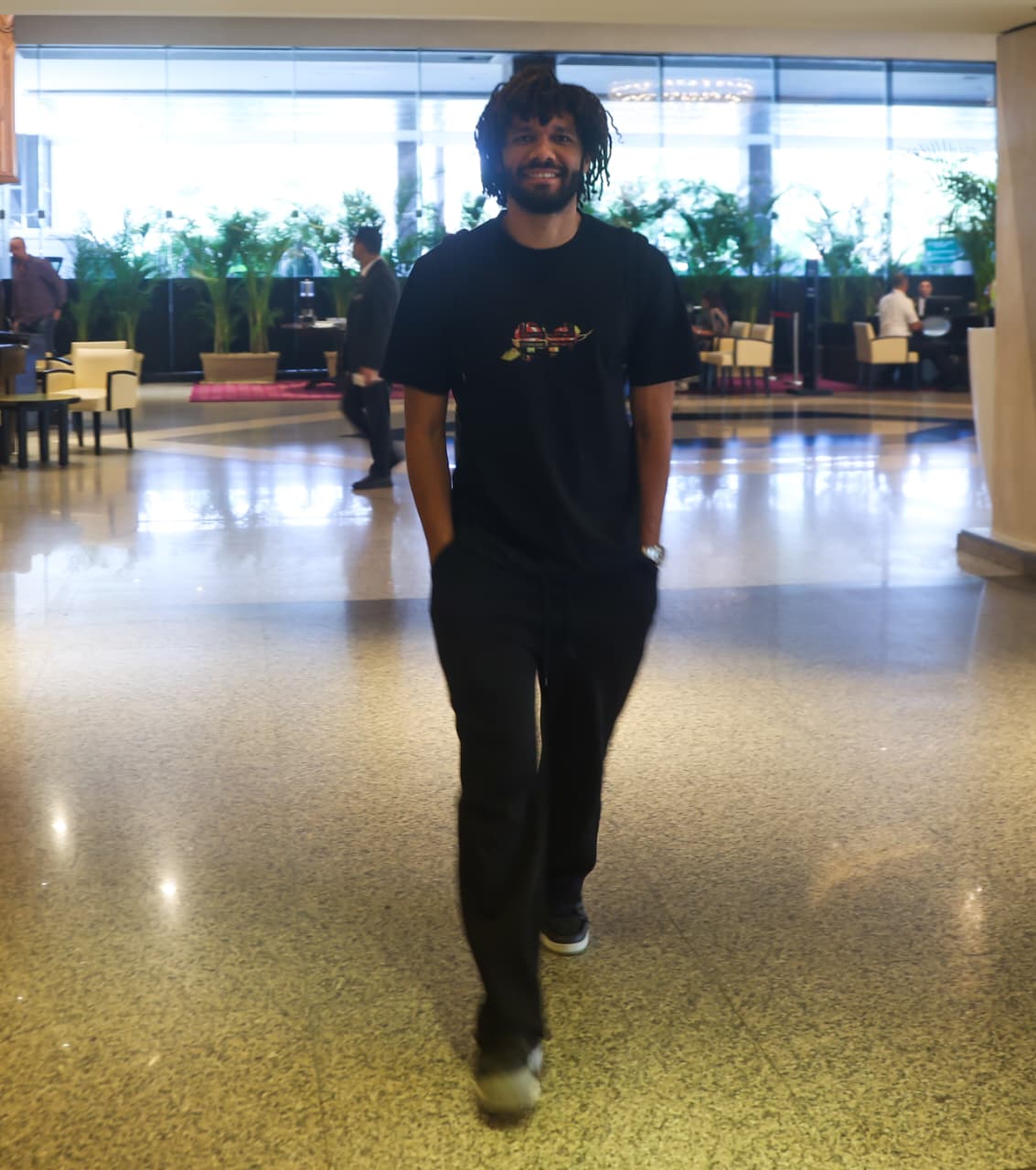 May be an image of one or more people, beard and eyewear