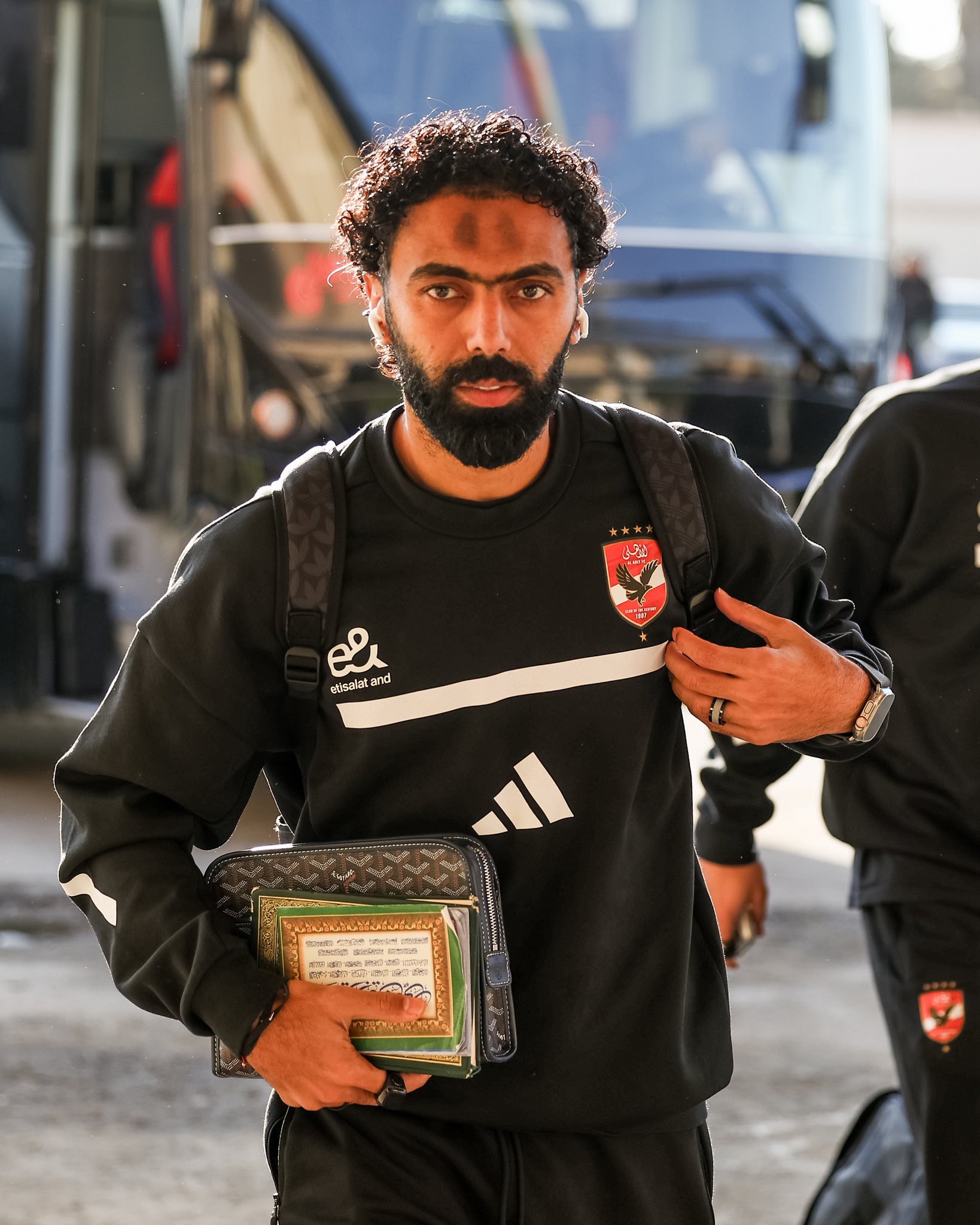 May be an image of one or more people, beard, people playing football, people playing soccer and text